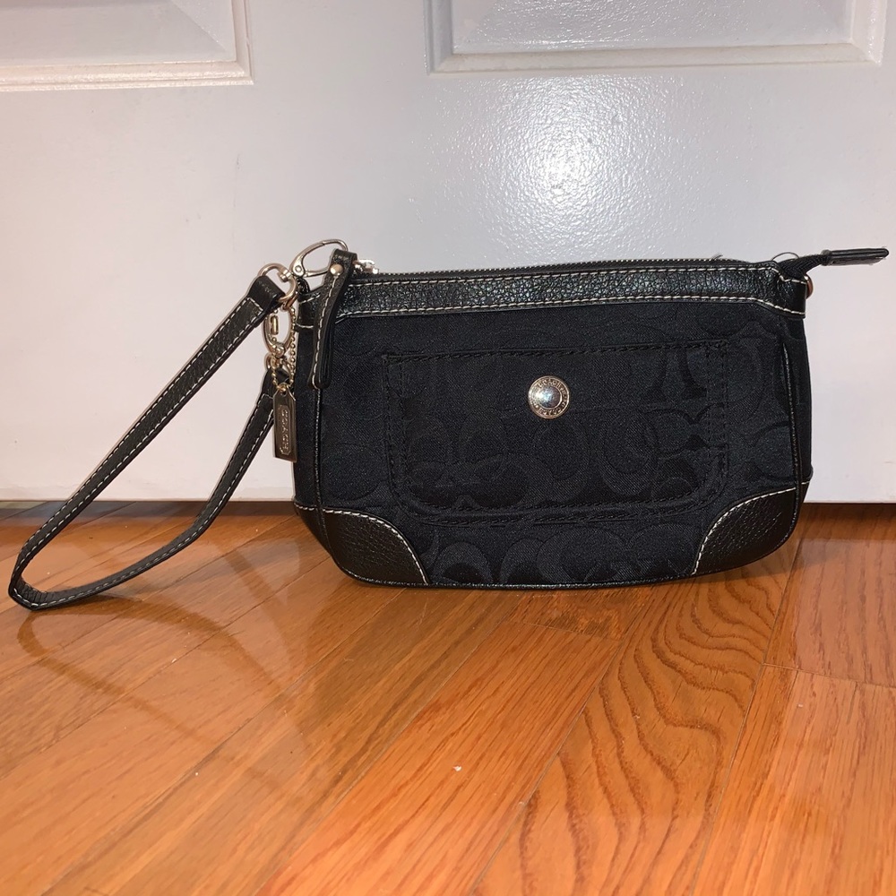 Black elegant Coach wristlet/ cross body purse